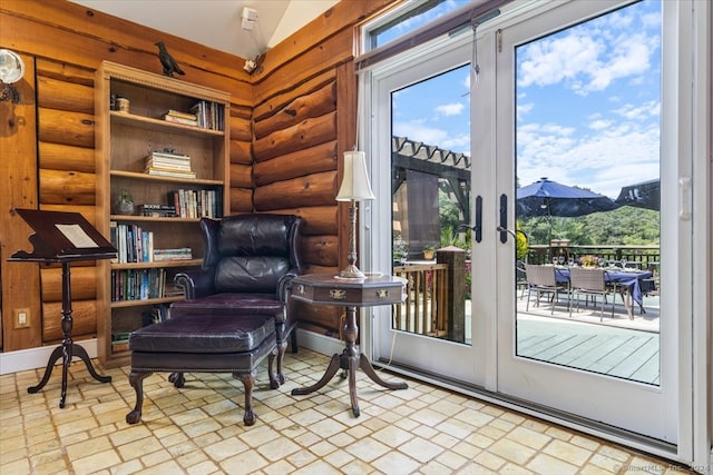 interior space featuring lofted ceiling and a mountain view