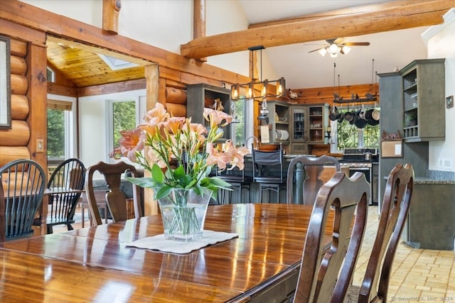 584 Prospect St, Woodstock, CT 06281 - dining room with lofted ceiling with beams and ceiling fan with notable chandelier