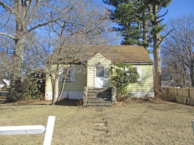 bungalow with a front lawn