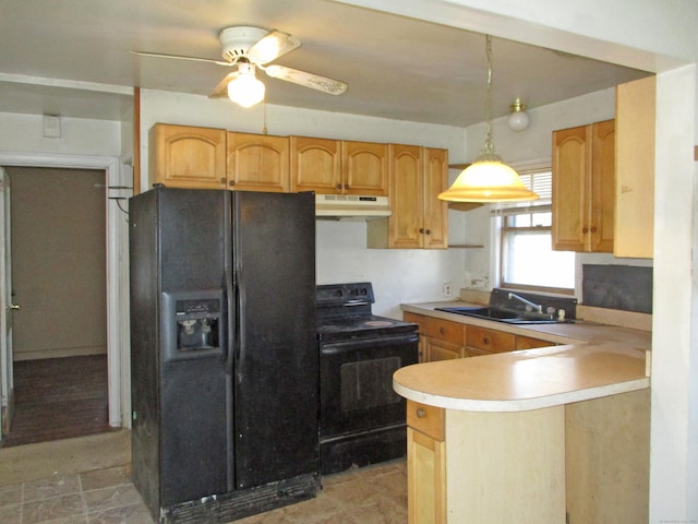 kitchen featuring kitchen peninsula, ceiling fan, sink, black appliances, and decorative light fixtures