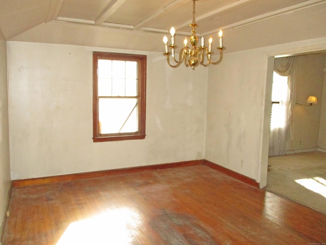 unfurnished room featuring a chandelier, vaulted ceiling with beams, and hardwood / wood-style flooring