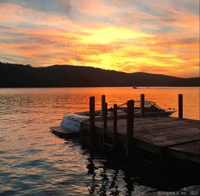 view of dock with a water view