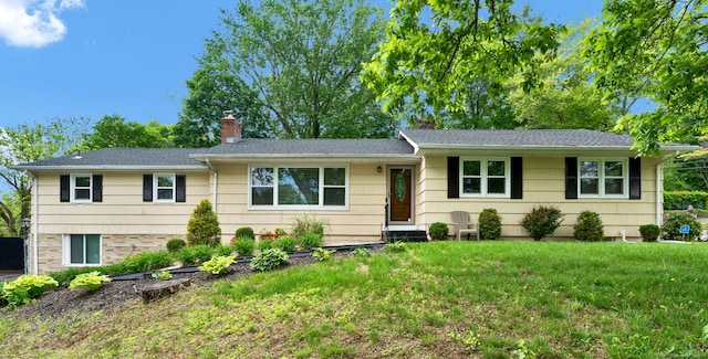 207 Jepson Ln, Meriden, CT 06451 - ranch-style home with a chimney, a front yard, and roof with shingles