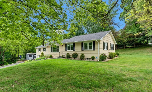 207 Jepson Ln, Meriden, CT 06451 - ranch-style house featuring a front yard and a shingled roof