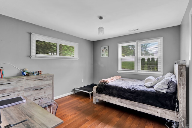 207 Jepson Ln, Meriden, CT 06451 - bedroom with dark wood-type flooring and baseboards