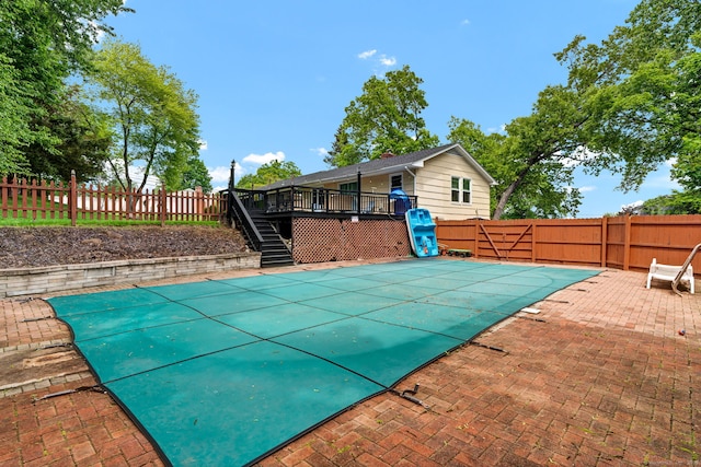 207 Jepson Ln, Meriden, CT 06451 - view of pool with stairs, a fenced backyard, a deck, and a patio area