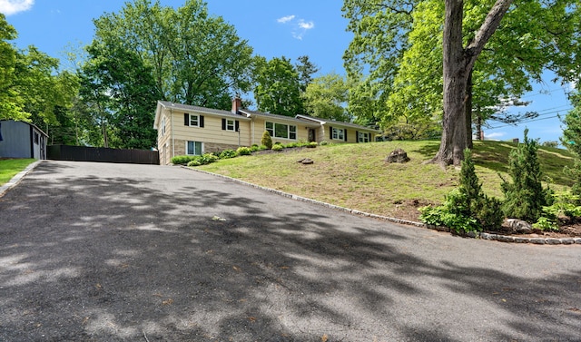 207 Jepson Ln, Meriden, CT 06451 - ranch-style house with a chimney