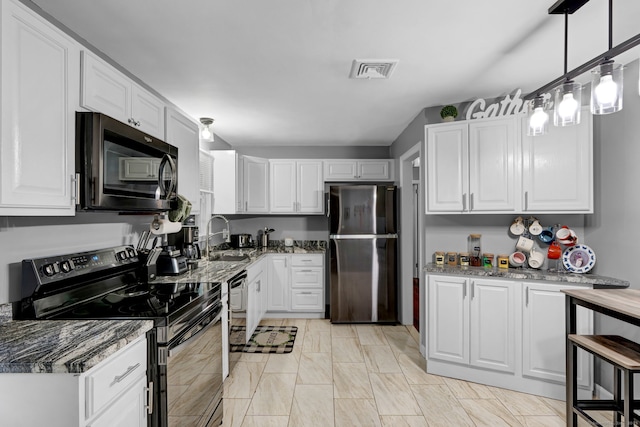 207 Jepson Ln, Meriden, CT 06451 - kitchen with black appliances, a sink, and white cabinets
