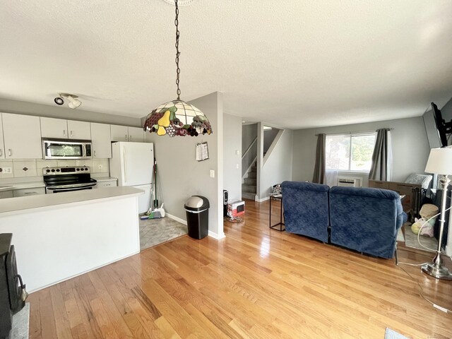 living room with light hardwood / wood-style floors