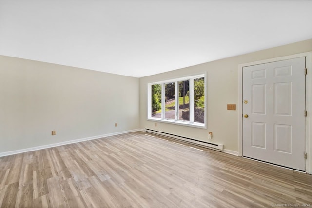 interior space featuring a baseboard radiator and light wood-type flooring