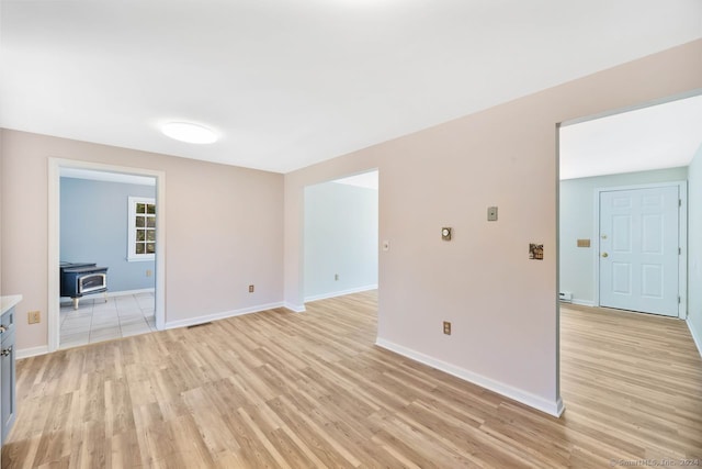 unfurnished living room with light hardwood / wood-style floors