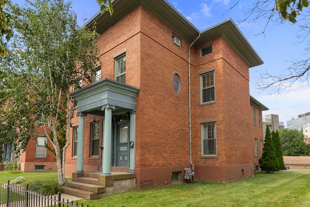 view of front of home with a front lawn