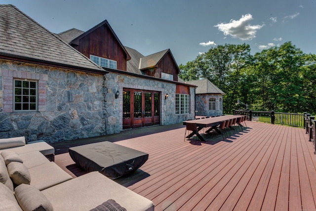 wooden deck with an outdoor hangout area