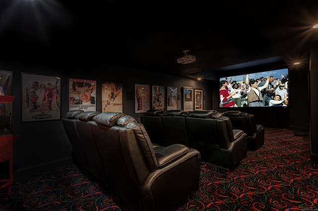 cinema room featuring carpet flooring