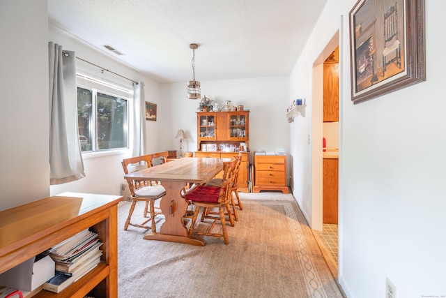 view of carpeted dining room