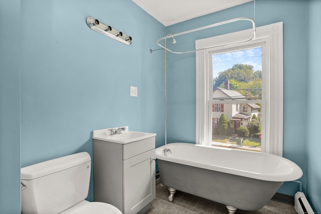 bathroom featuring vanity, toilet, and a baseboard heating unit