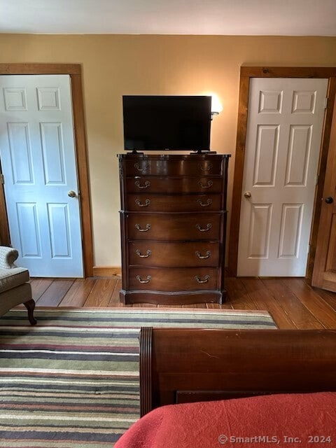 bedroom featuring hardwood / wood-style flooring