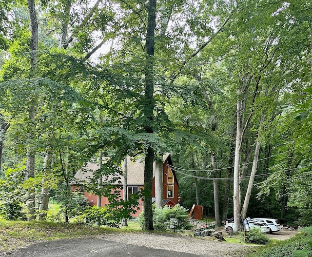 130 Valley Rd, North Branford, CT 06471 - view of front of house featuring a view of trees