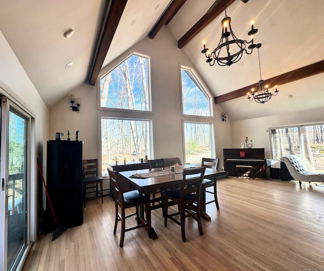130 Valley Rd, North Branford, CT 06471 - dining area featuring high vaulted ceiling, a notable chandelier, light wood-type flooring, and beamed ceiling