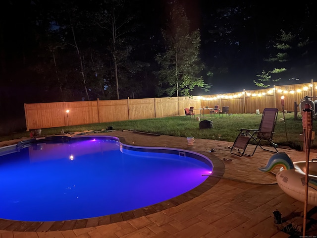 130 Valley Rd, North Branford, CT 06471 - pool at twilight with a patio area, a fenced backyard, and a yard