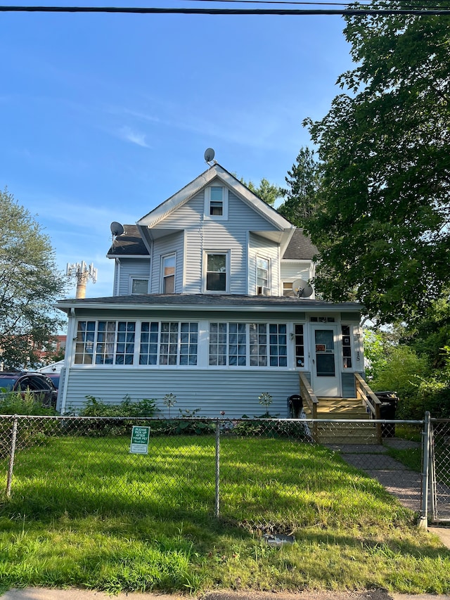 view of front of house with a front yard