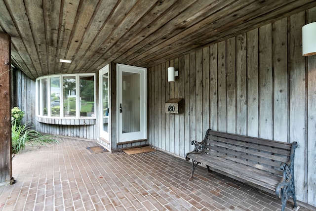 doorway to property with a patio area