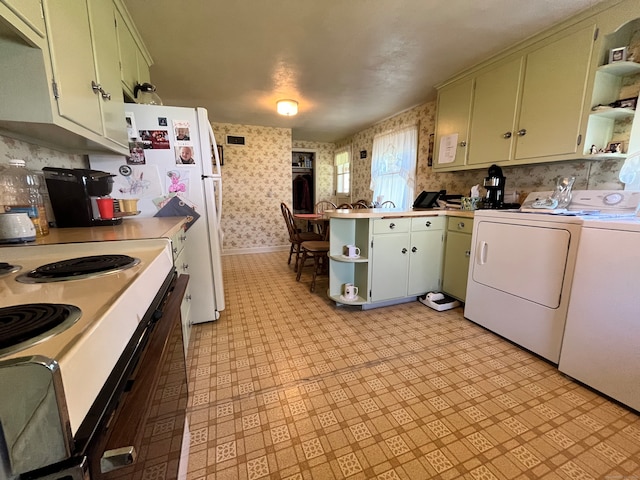 kitchen featuring white electric stove, washing machine and dryer, and green cabinetry