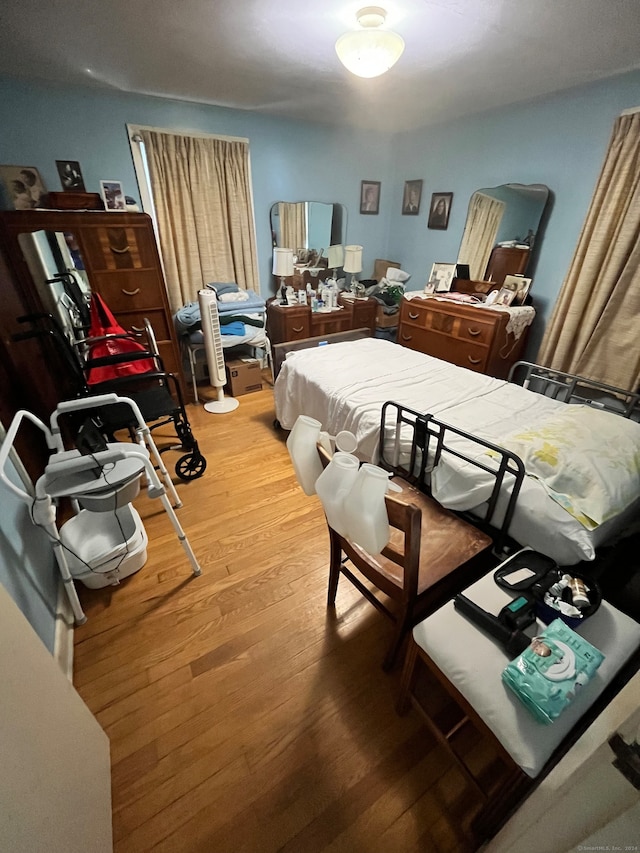 bedroom featuring hardwood / wood-style floors