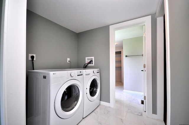 laundry area featuring independent washer and dryer