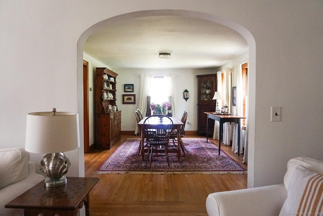 dining space featuring hardwood / wood-style flooring