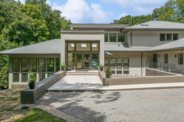 back of property with french doors