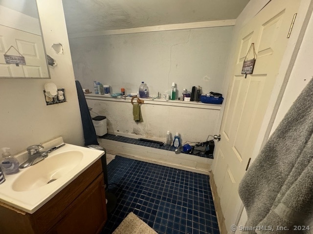 bathroom with vanity and tile patterned floors