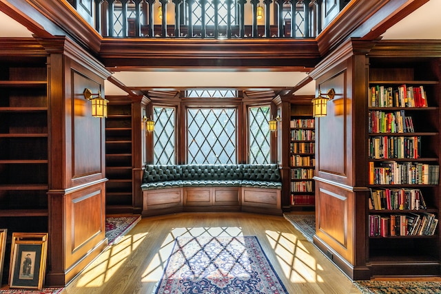 interior space featuring a high ceiling and light wood-style floors