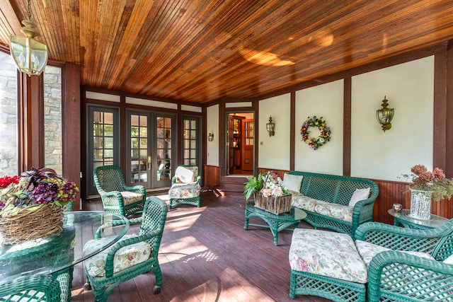 sunroom featuring french doors and wood ceiling