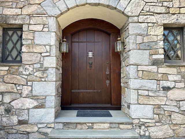 13 Cobble Heights Rd, Kent, CT 06757 - doorway to property featuring stone siding