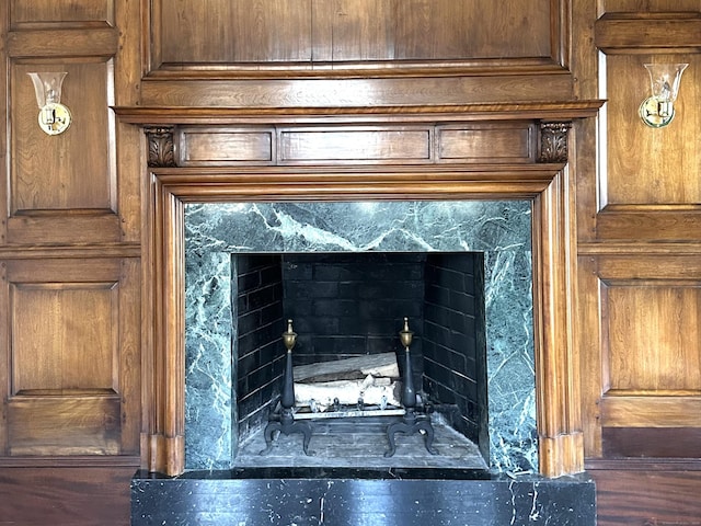 interior details featuring a high end fireplace