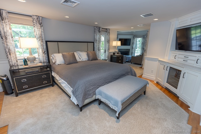 bedroom with light wood-type flooring