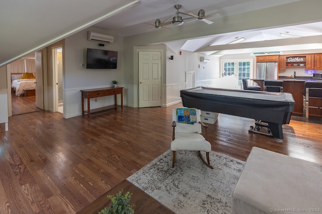 playroom with beamed ceiling, dark wood-type flooring, a wall mounted AC, billiards, and ceiling fan