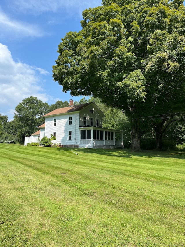 exterior space featuring a lawn