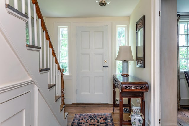 entrance foyer featuring hardwood / wood-style floors and a wealth of natural light