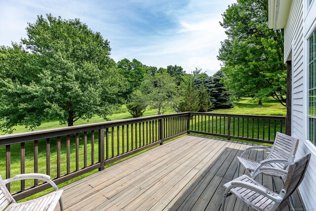 deck featuring a lawn