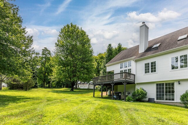 view of yard with a deck