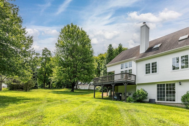 view of yard with a deck