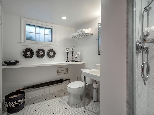 full bath with toilet, recessed lighting, and tile patterned floors