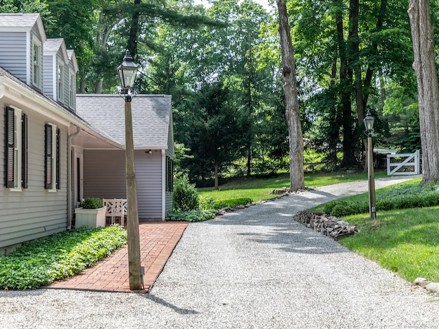 view of road featuring driveway