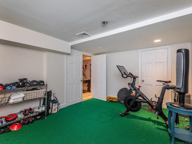 workout area with carpet, visible vents, and recessed lighting