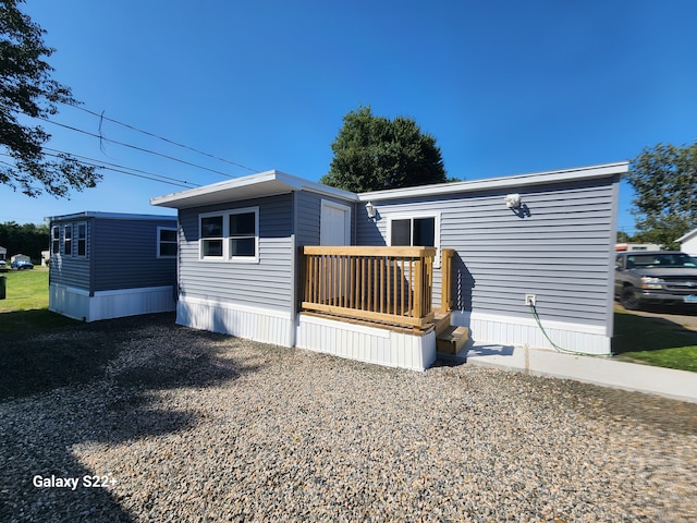 exterior space with a wooden deck