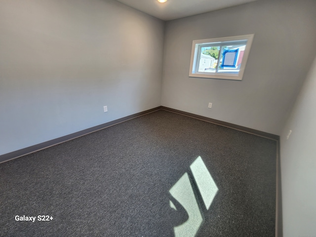 empty room with carpet flooring