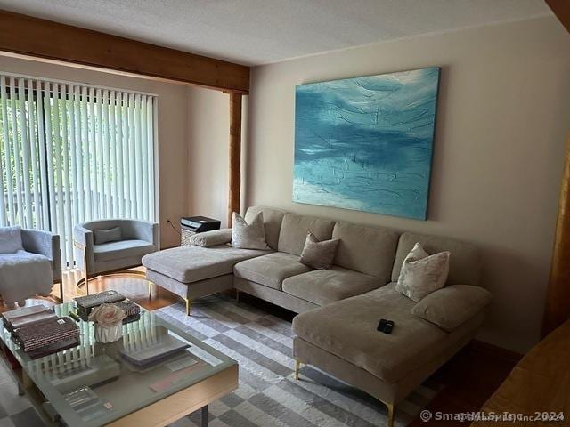 living room featuring a textured ceiling