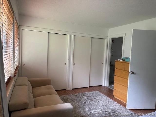 living room with dark wood-type flooring